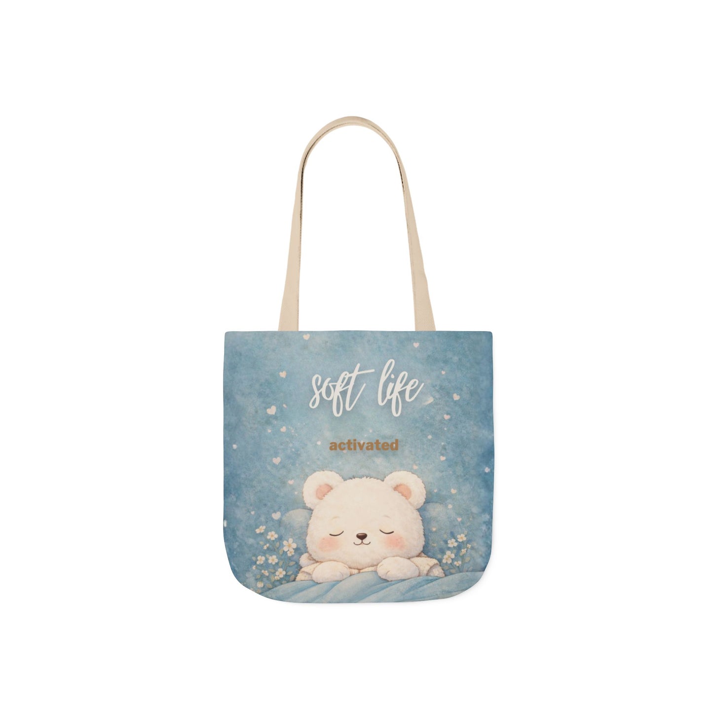 Tote bag with a cute bear design and 'soft life activated' text on a blue background