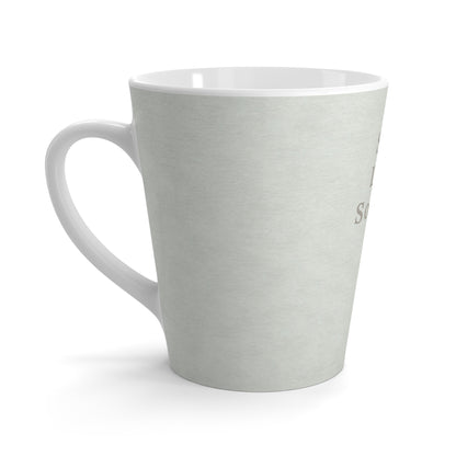 Light green mug with 'Soft Life Society' branding on a white background