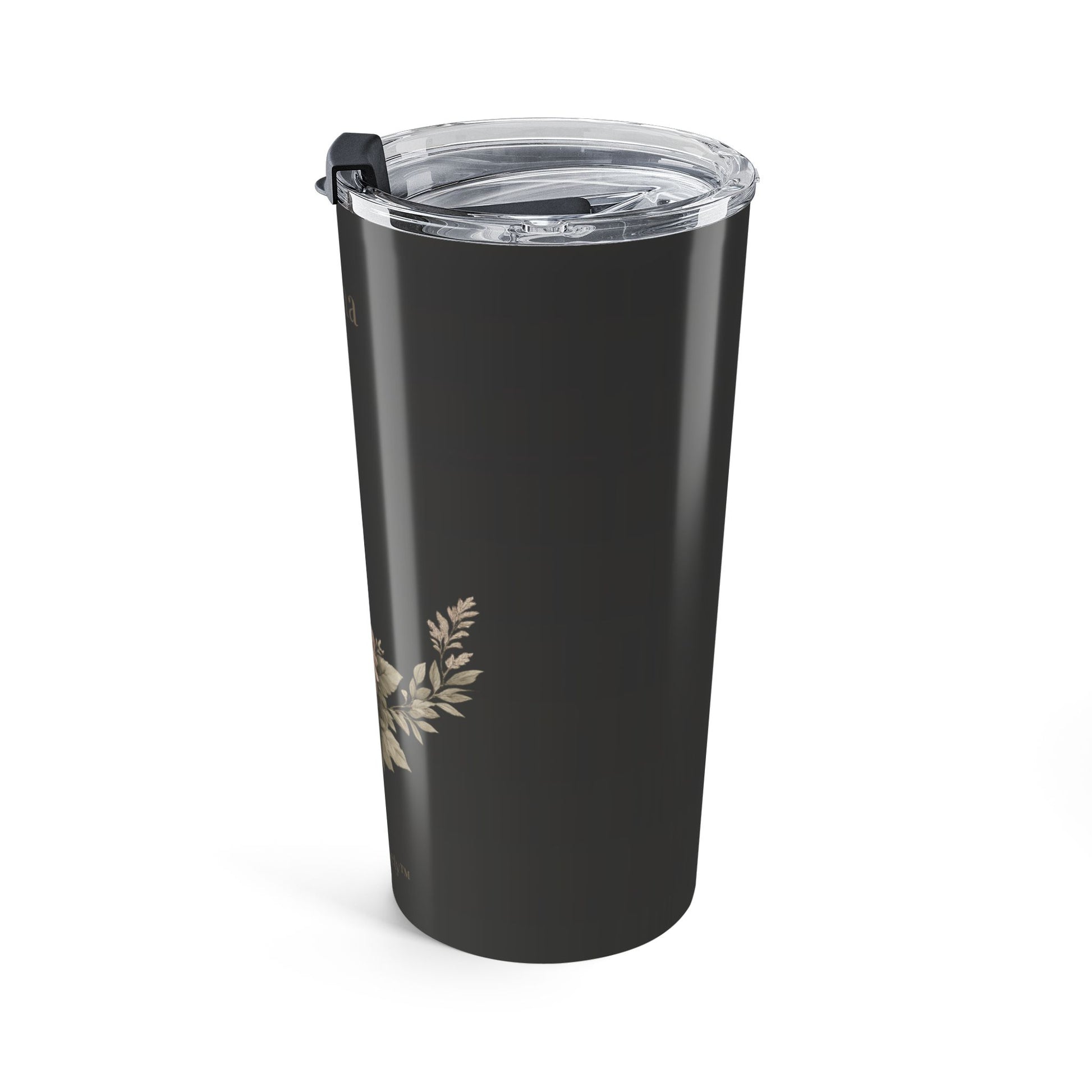 Black tumbler with floral design on a white background