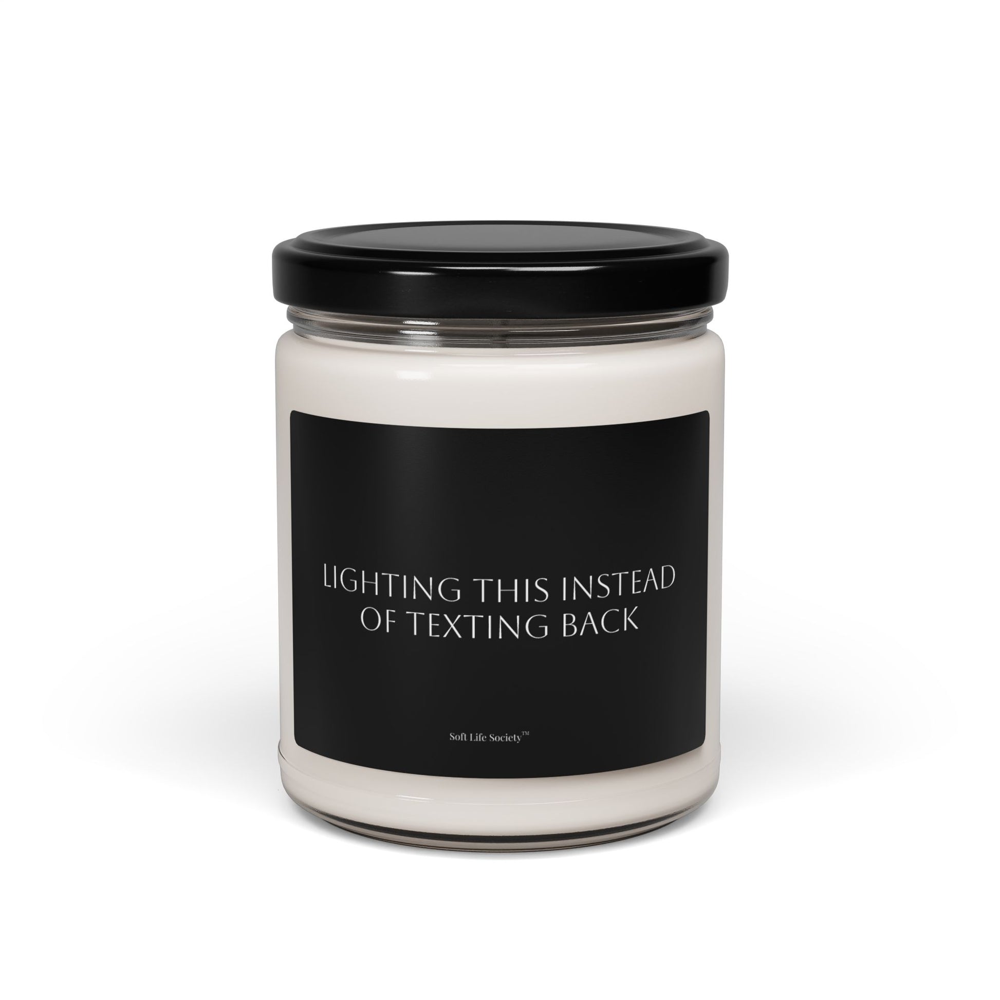 Candle jar with a black label on a white background