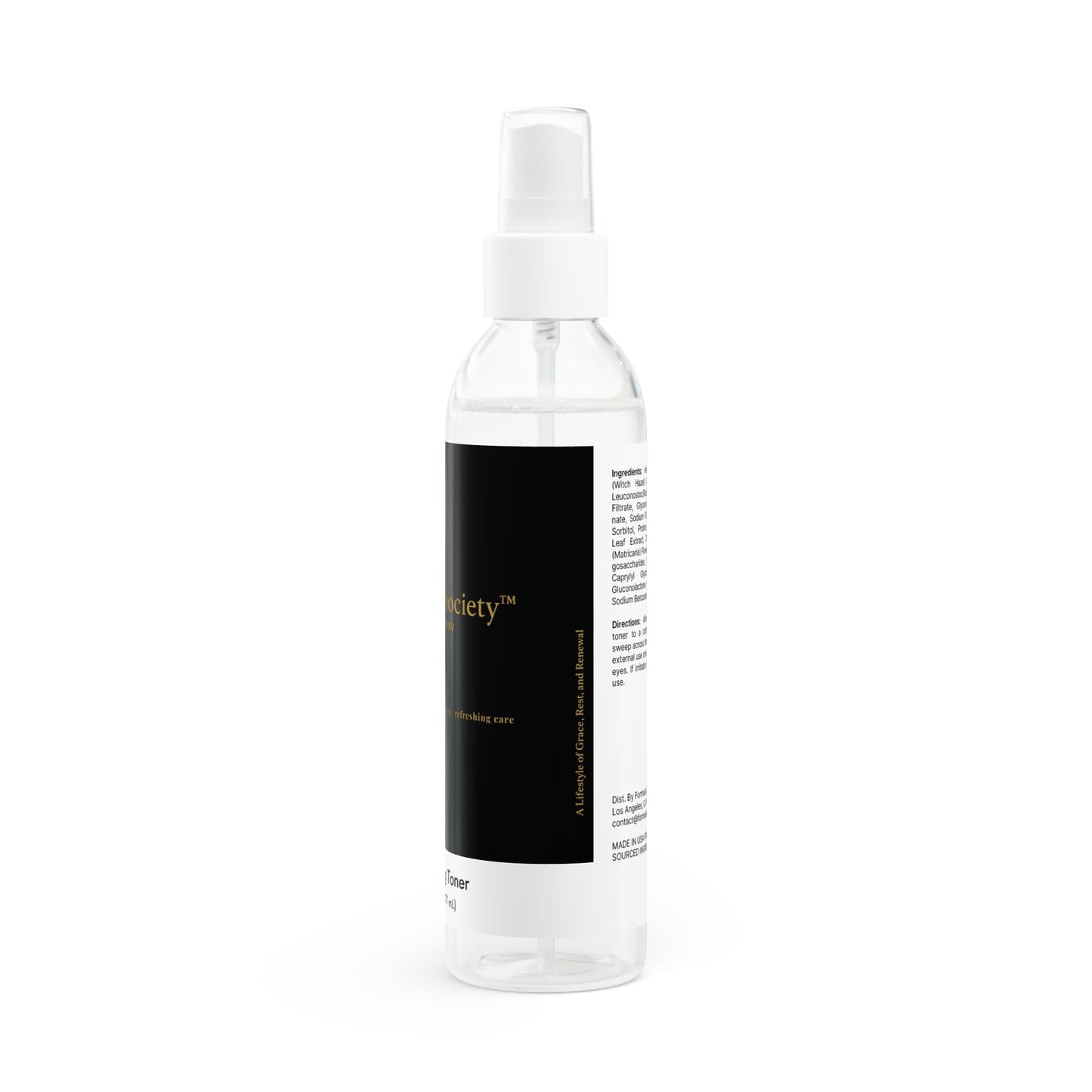 Clear spray bottle with a 'Soft Life Society' black label on a white background