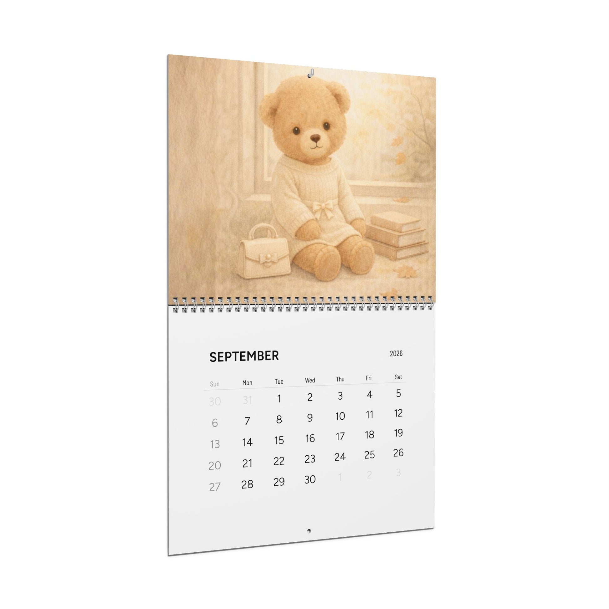 Calendar with a teddy bear on a wooden background