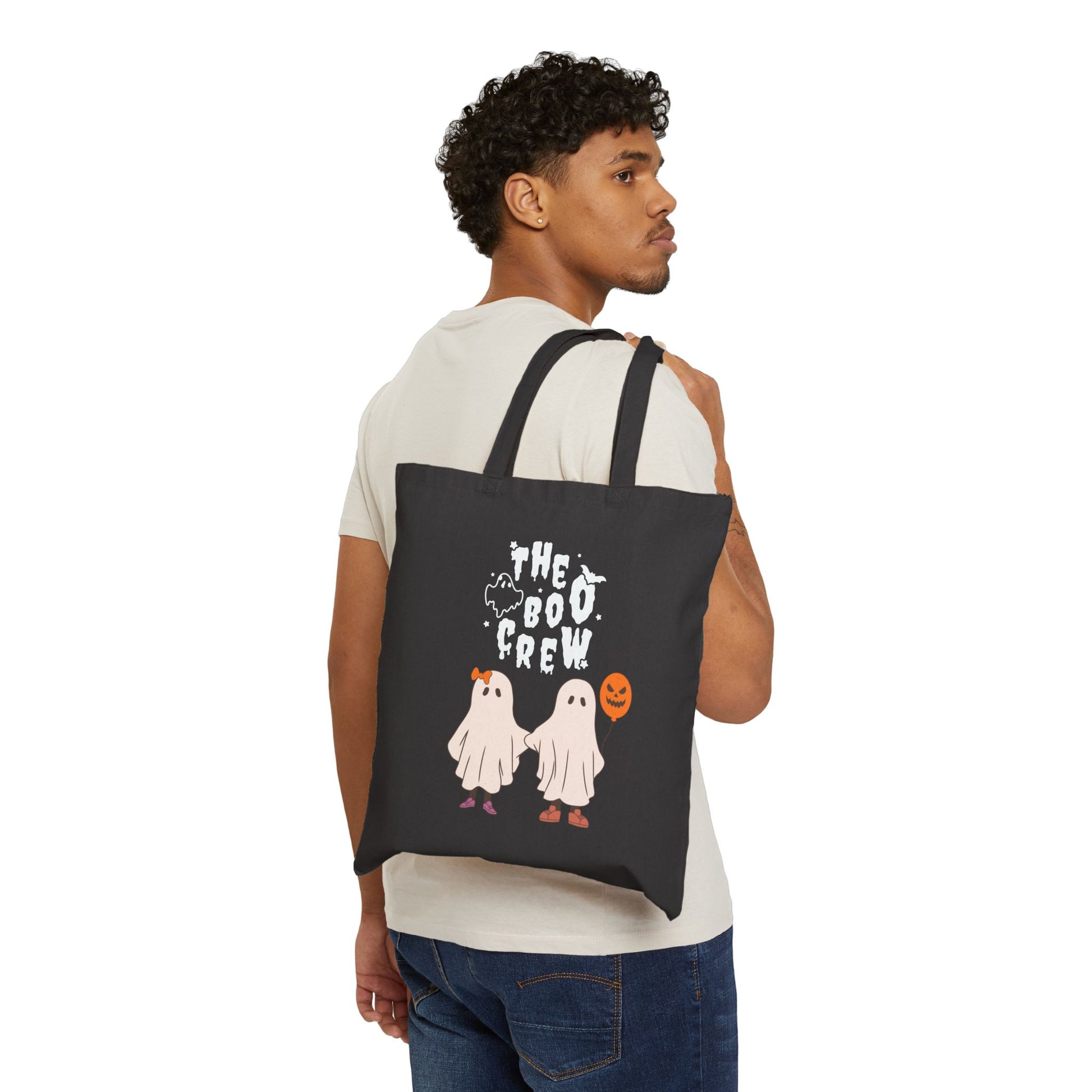 The Boo Crew Halloween Tote Bag made from 100% cotton canvas, featuring a cute ghost duo design.