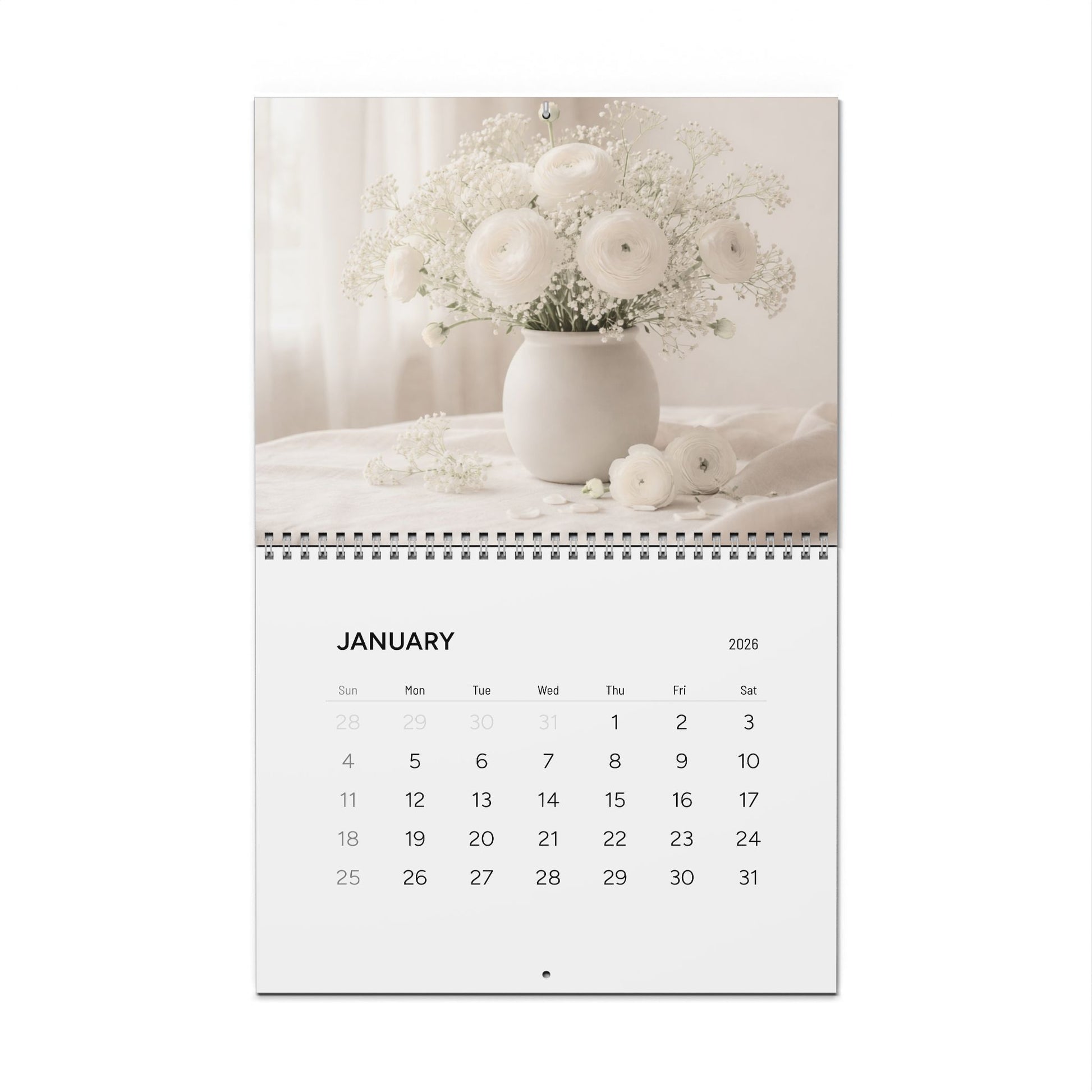 Calendar for January 2026 with a floral arrangement on a white background
