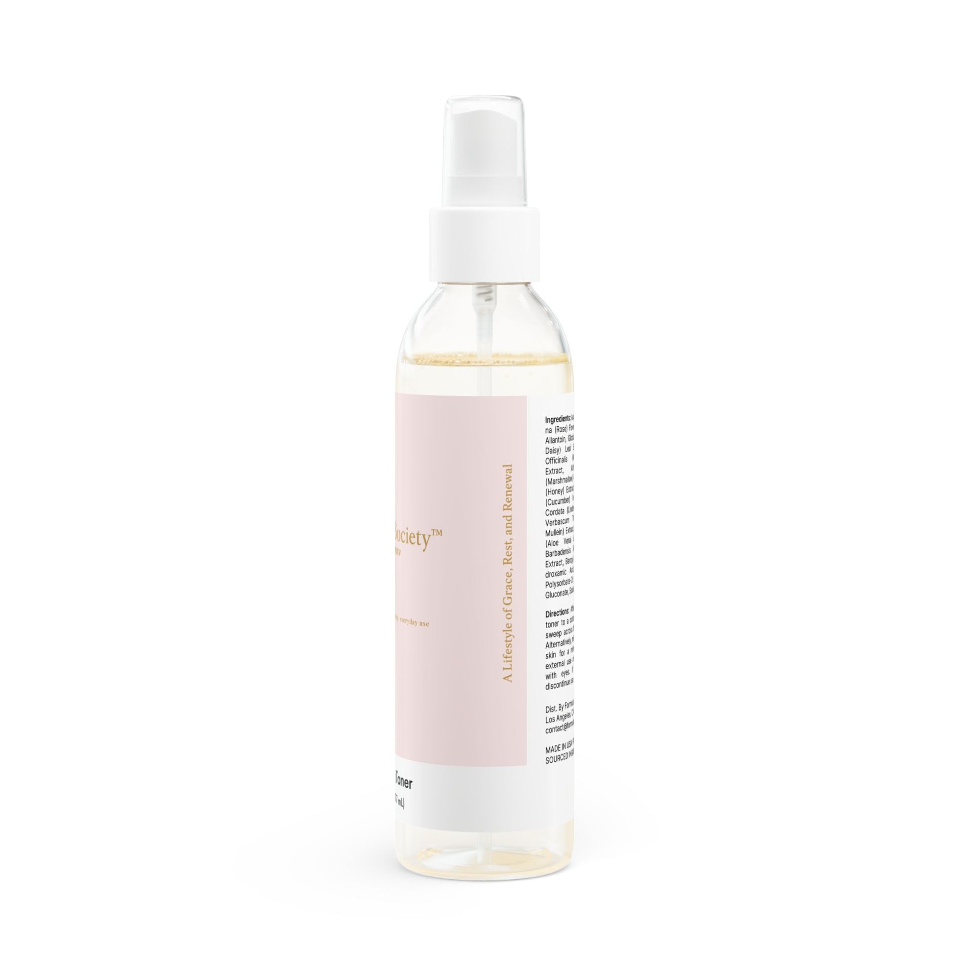 Side view of Soft Life Society skincare product with a pink label on a white background