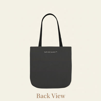 Back view of black canvas tote bag minimal design plain reverse side