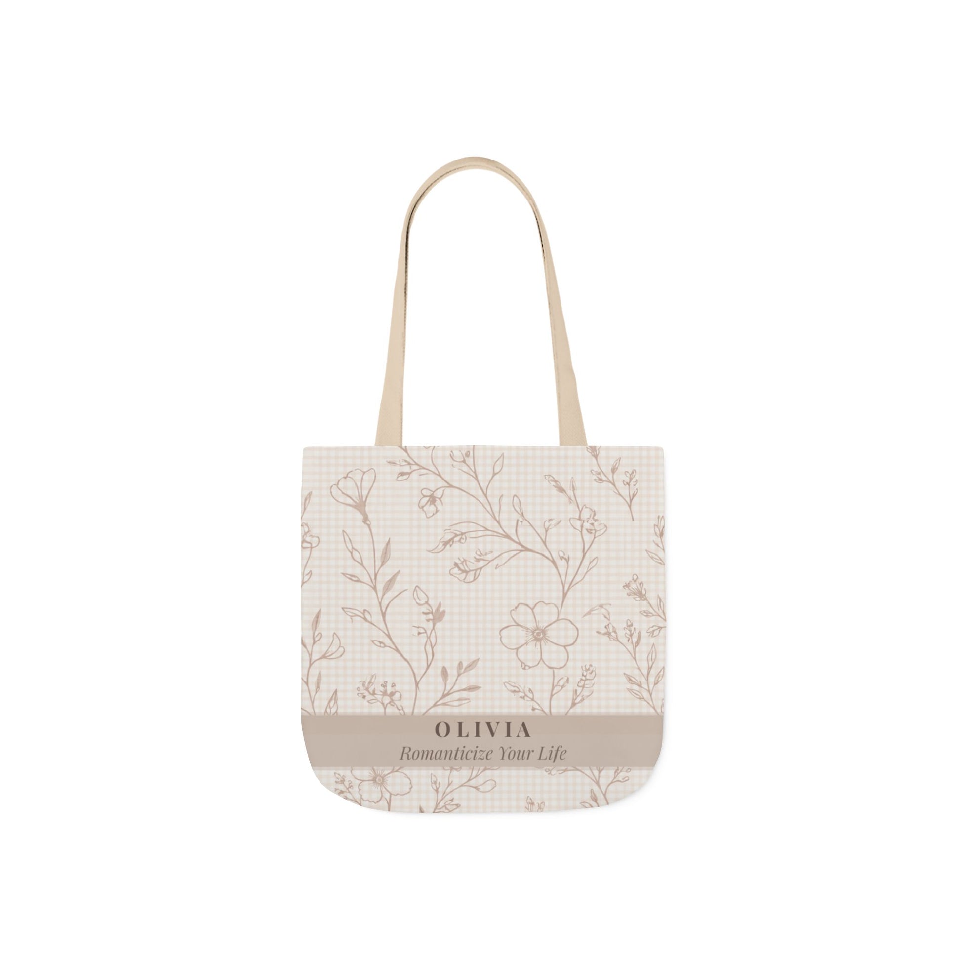 Tote bag with floral pattern and 'Olivia' branding on a white background