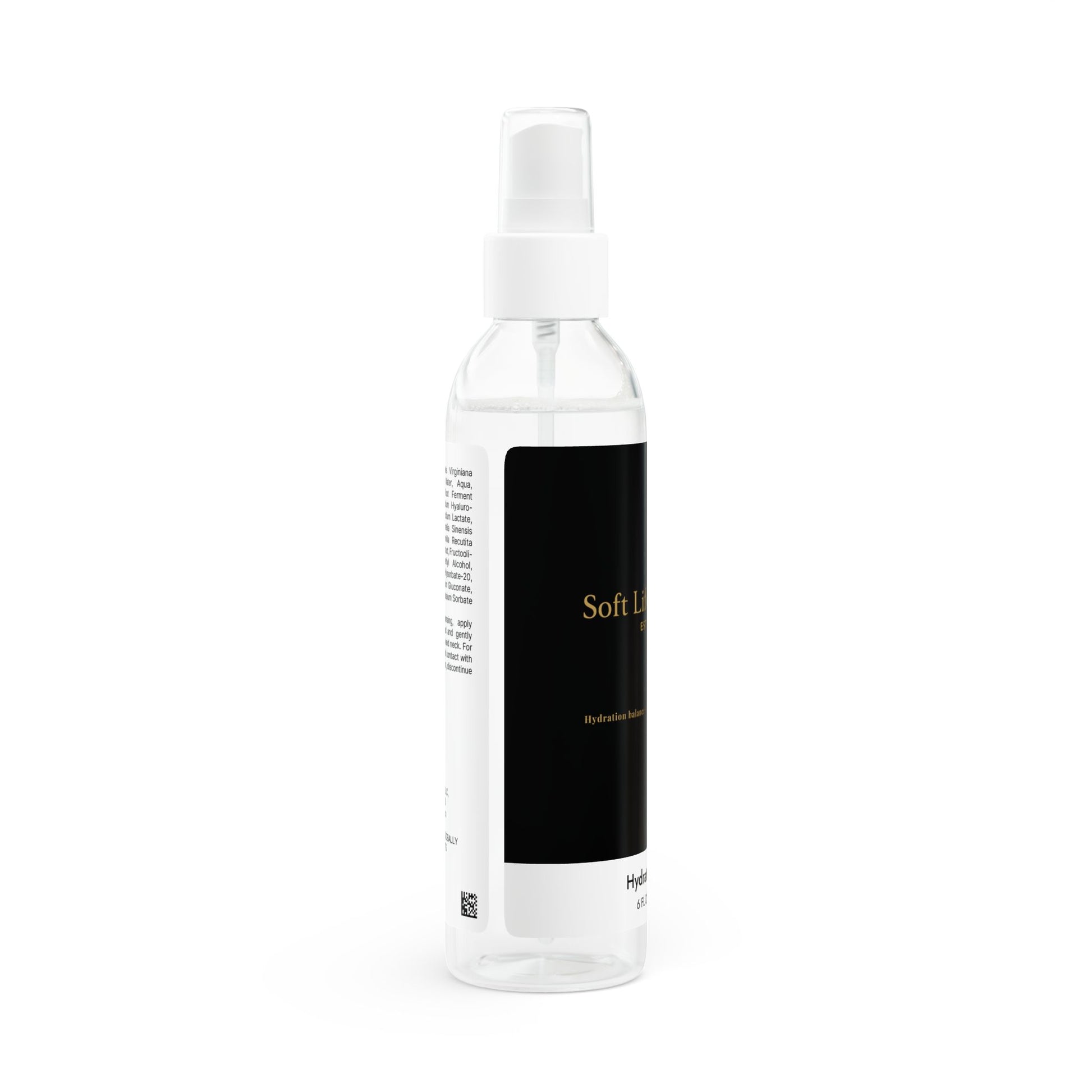 Clear spray bottle with a 'Soft Life Society' black label on a white background