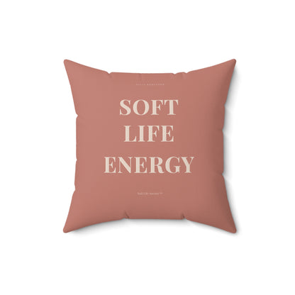 Pink pillow with 'SOFT LIFE ENERGY' text on a white background