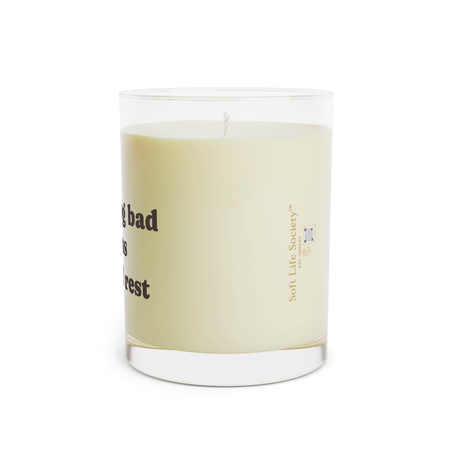 Candle with a Soft Life Society logo on a white background