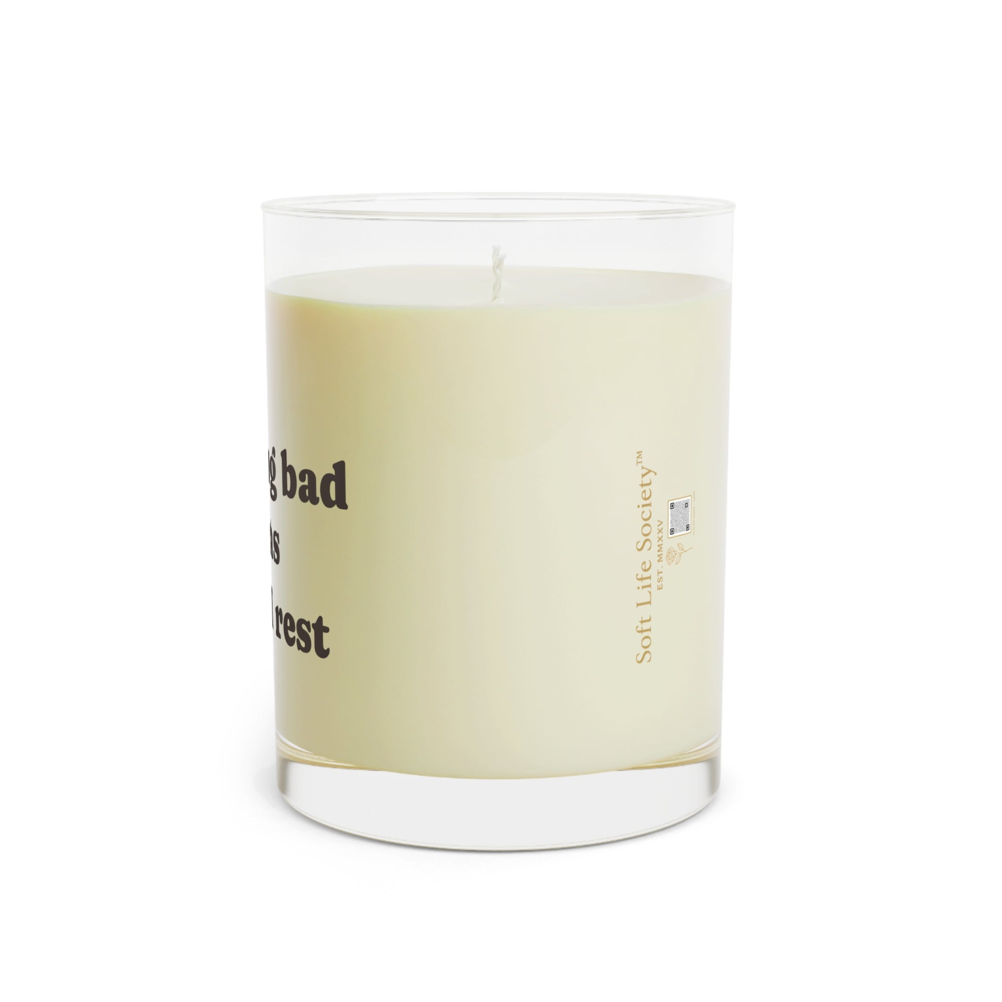 Candle with a Soft Life Society logo on a white background