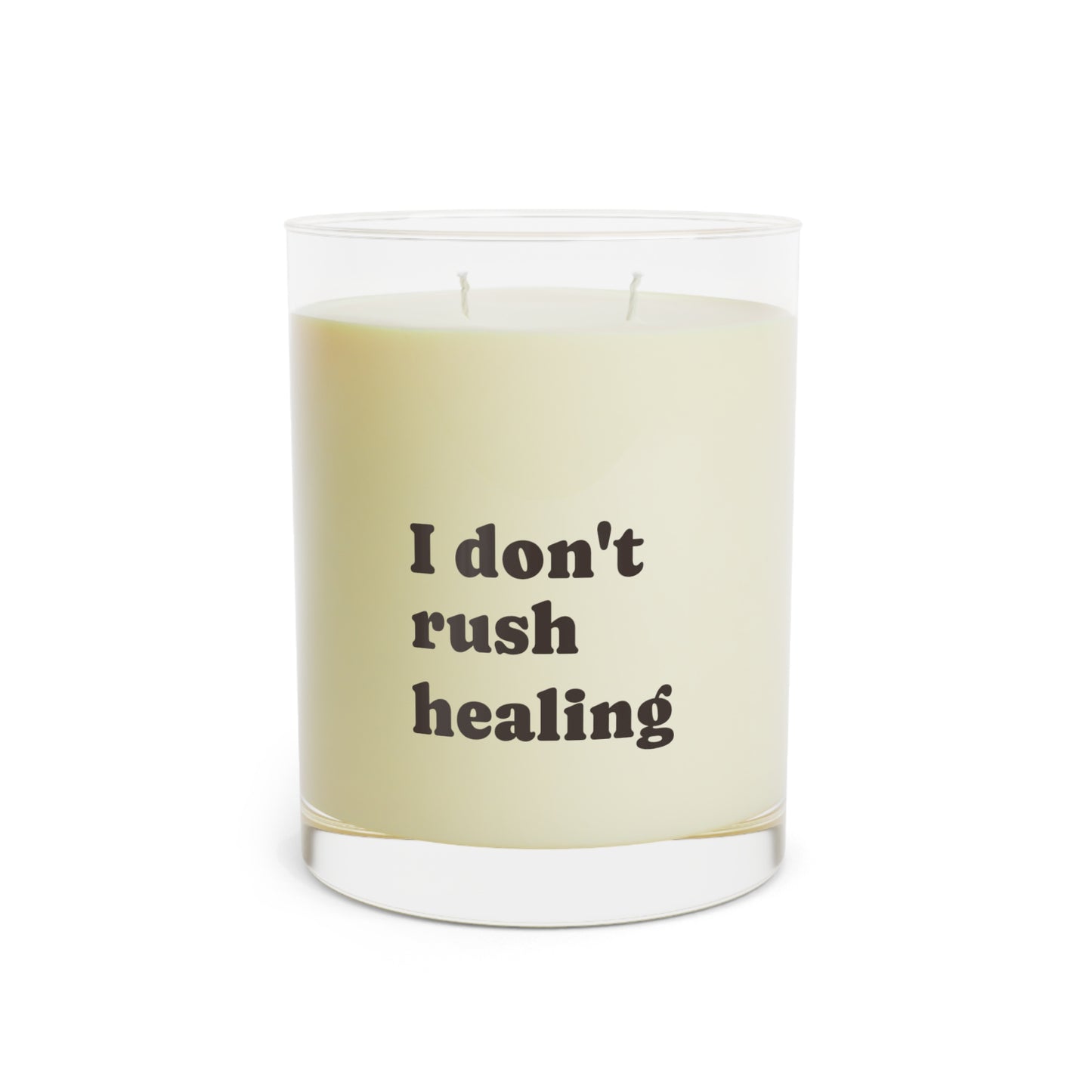 Soft Life Society Affirmation Signature Candle with text 'I don't rush healing' on a white background