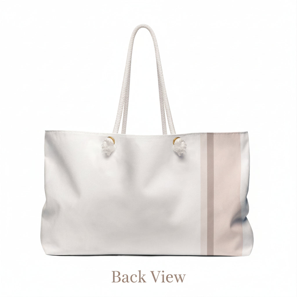 White tote bag with a subtle blush striped pattern on a white background
