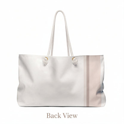 White tote bag with a subtle blush striped pattern on a white background