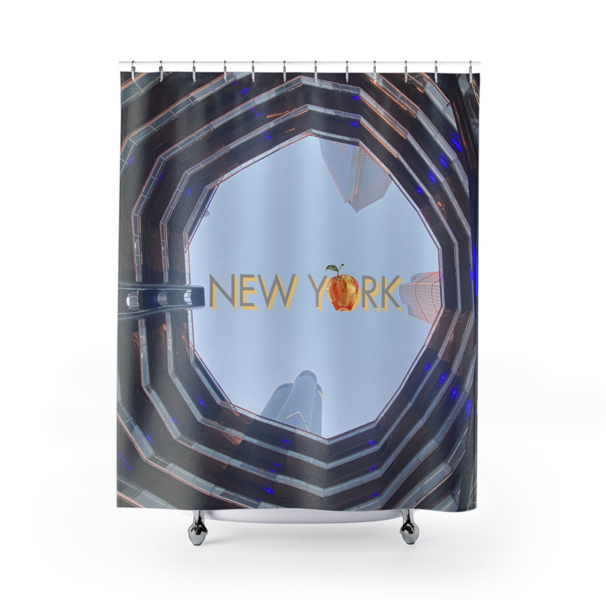 Upward view of The Vessel at Hudson Yards with "New York" and apple graphic on a shower curtain
