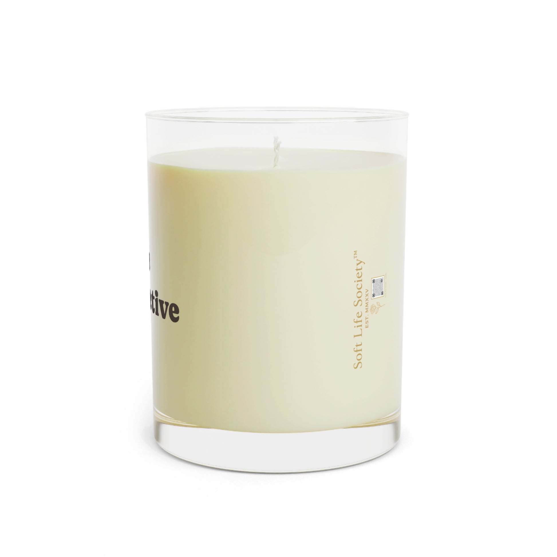 Candle with Soft Life Society logo on a white background