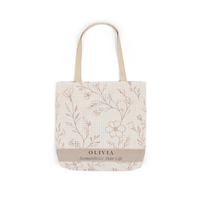 Tote bag with floral pattern and 'Olivia' branding on a white background