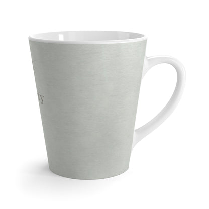 Side view of sage green mug with a subtle texture on a white background