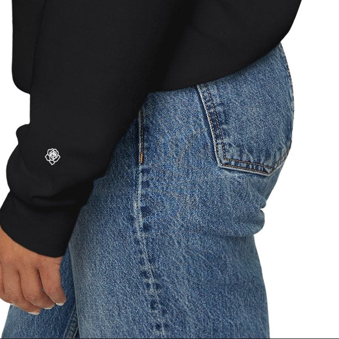 Closeup view of signature rose for "Soft Life Society" sweatshirt. 