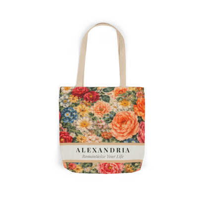 Floral tote bag with 'Alexandria' branding on a white background