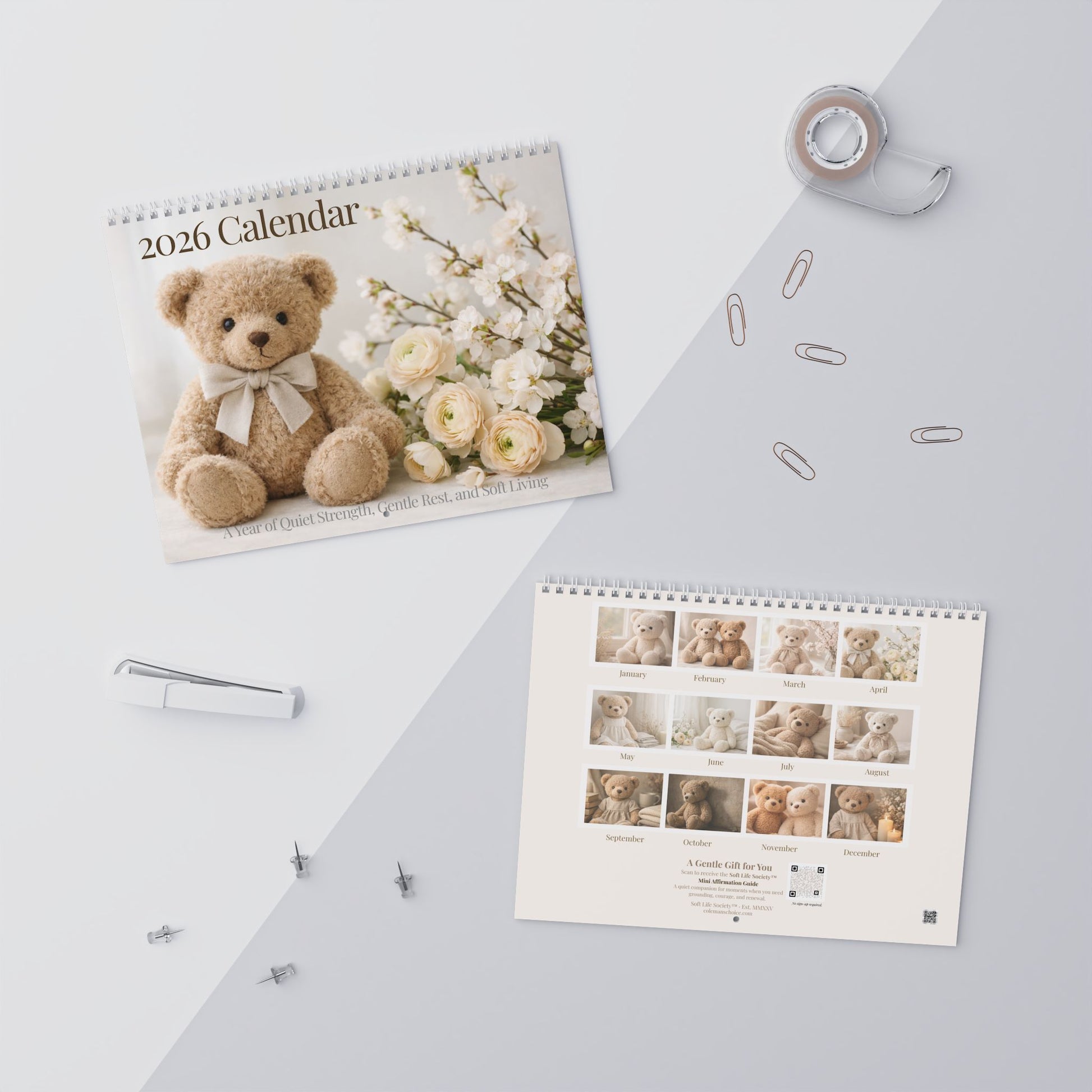 2026 calendar with teddy bear and flowers design on a light surface.