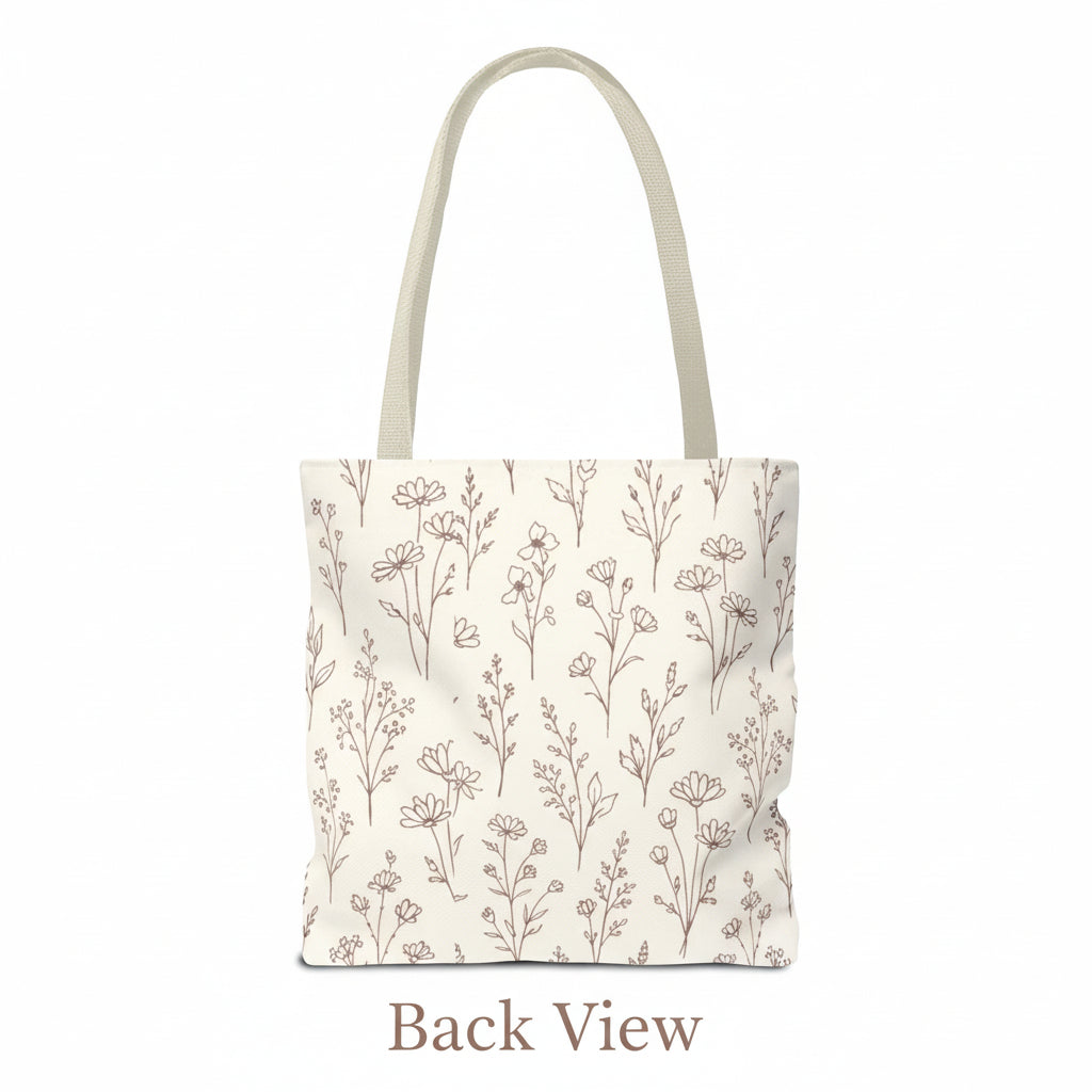 Back view of tote bag with floral pattern on a white background