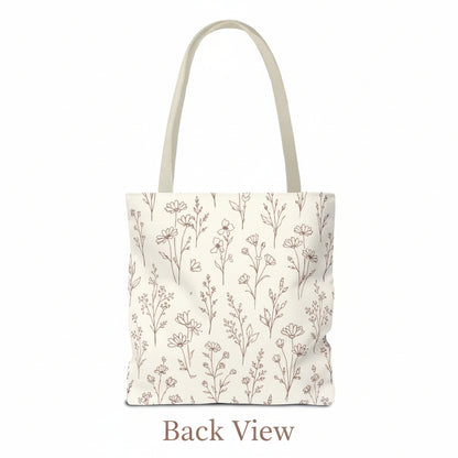 Back view of tote bag with floral pattern on a white background