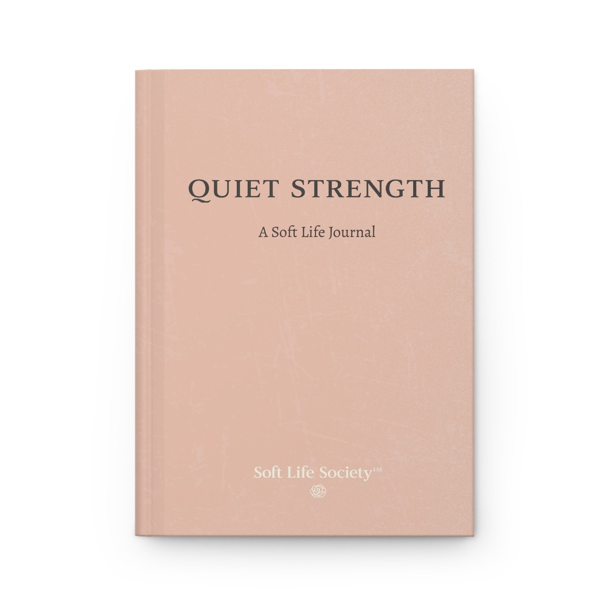 Hardcover journal titled 'Quiet Strength' by Soft Life Society on a beige background
