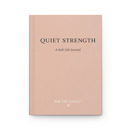 Hardcover journal titled 'Quiet Strength' by Soft Life Society on a beige background