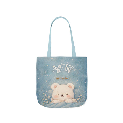 Tote bag with a bear design and text on a white background