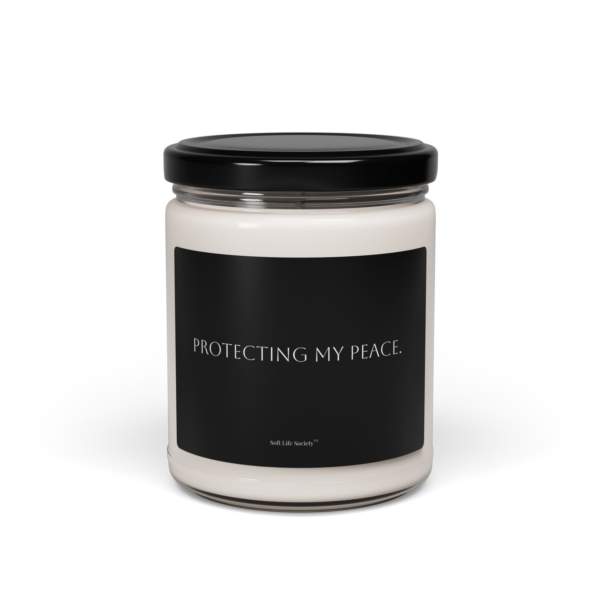 Black minimalist candle jar with white wax labeled “Protecting my Peace.” by Soft Life Society™