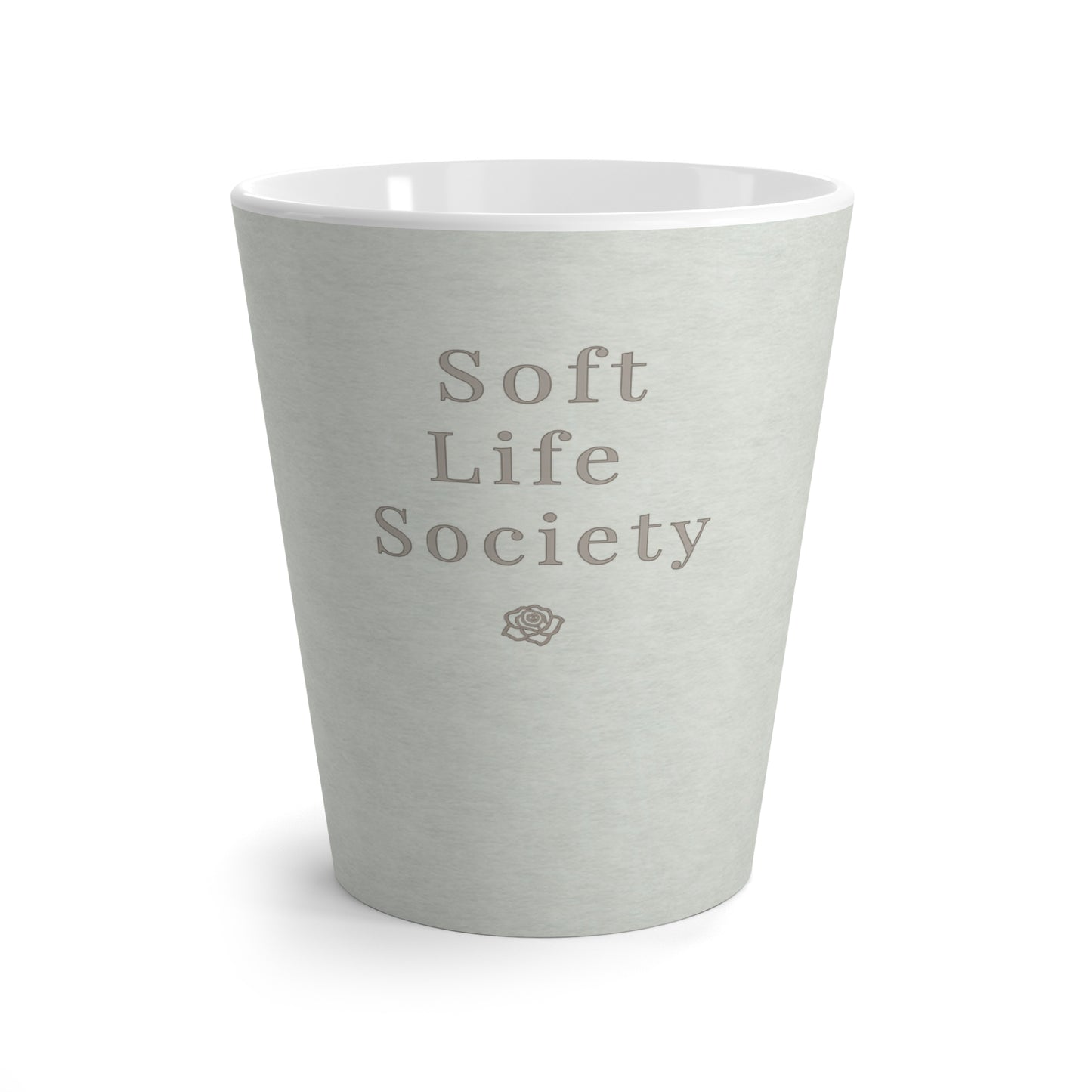 Light green ceramic cup with 'Soft Life Society' text on a white background