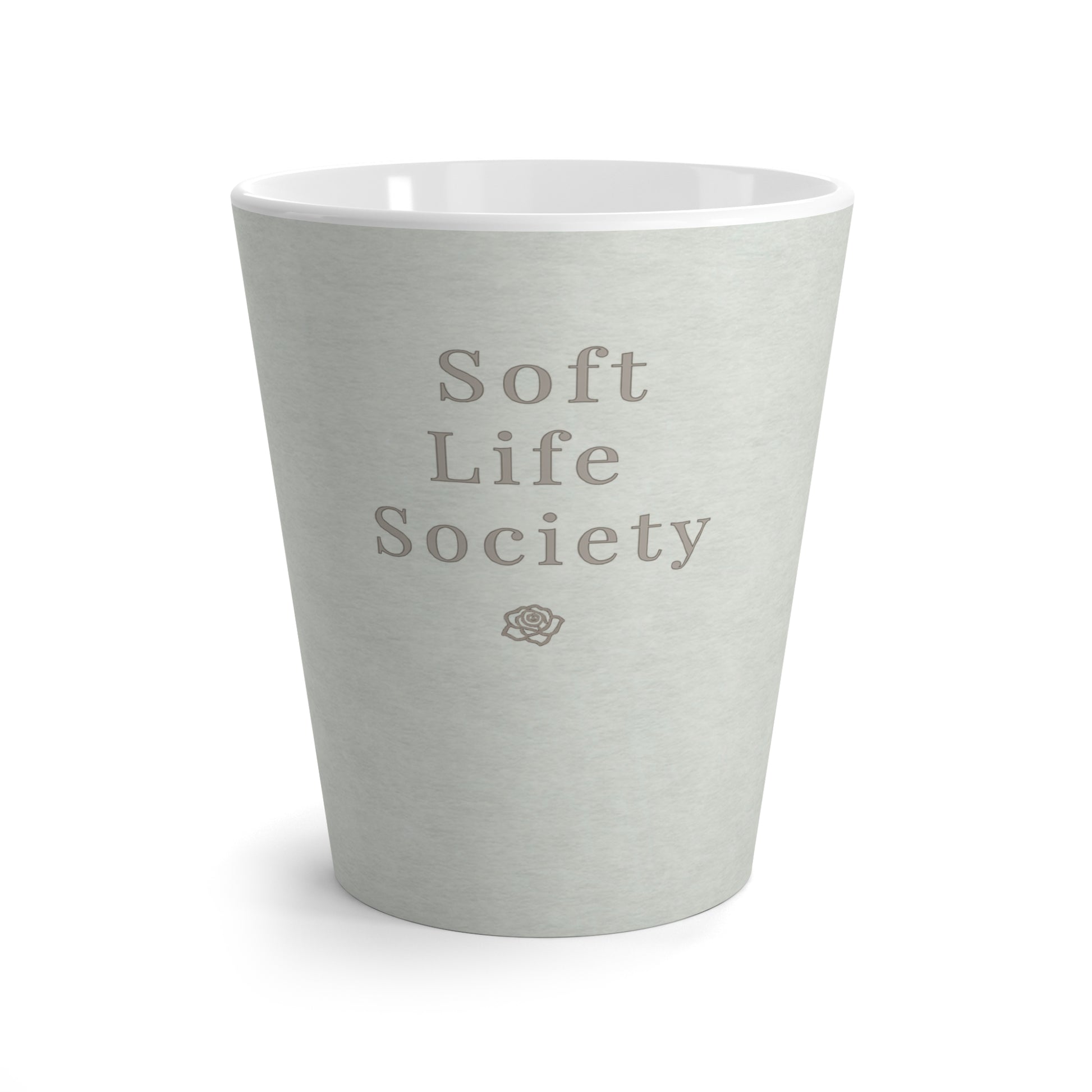 Light green ceramic cup with 'Soft Life Society' text on a white background