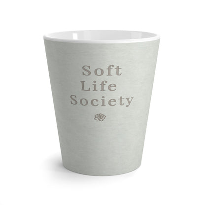 Light green ceramic cup with 'Soft Life Society' text on a white background