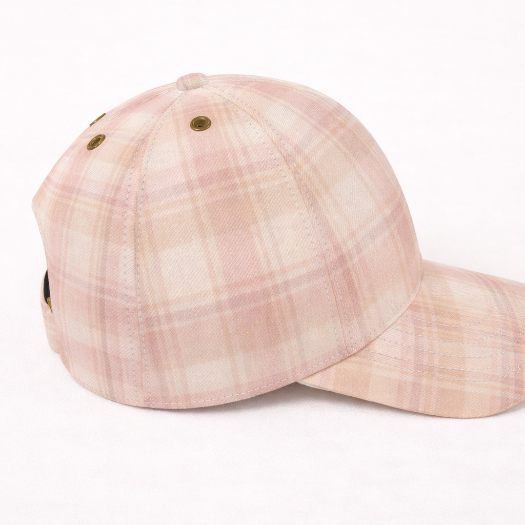 Pink plaid baseball cap on a white background