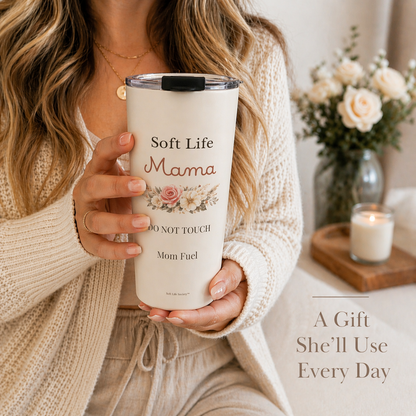 Soft Life Mama tumbler held by woman in cozy home setting, floral mom gift cup with “Mom Fuel” design, neutral aesthetic with candle and flowers, Mother’s Day gift idea.