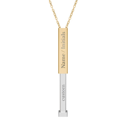 Gold and silver necklace with a bar pendant on a white background