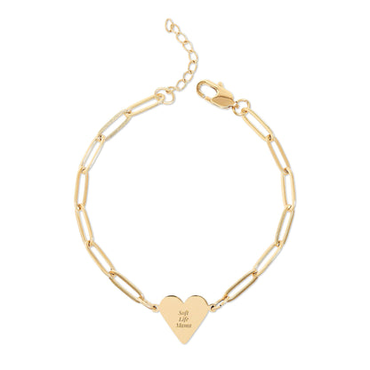 Gold paperclip bracelet with a heart-shaped pendant engraved with 'Soft Life Mama' on a white background
