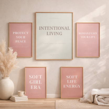 Wall with framed posters featuring motivational phrases in a home setting.