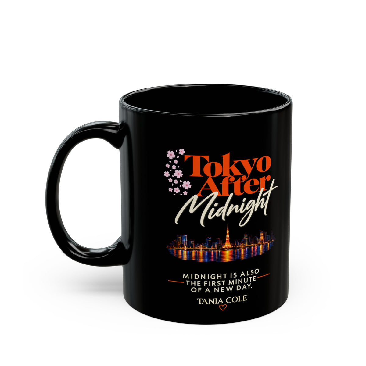Black ceramic mug featuring “Tokyo After Midnight” in orange and cream script, a colorful Tokyo skyline, cherry blossoms, and the quote “Midnight is also the first minute of a new day,” by Tania Cole, on a white background.
