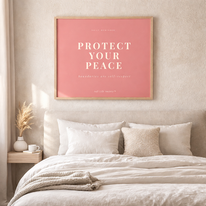 Bedroom with a pink framed poster on the wall