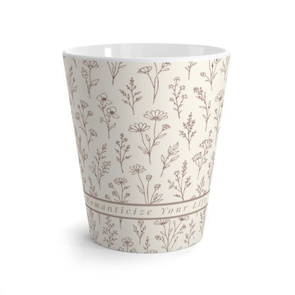 'Romanticize Your Life' Latte Mug with floral pattern on a white background