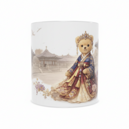 Ceramic mug with a teddy bear in traditional attire on a white background