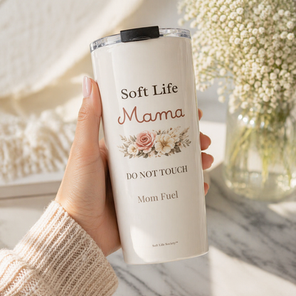 Hand holding tumbler (bright floral background)
Hand holding Soft Life Mama tumbler in sunlit neutral setting with flowers, aesthetic mom gift cup with floral design and soft tones