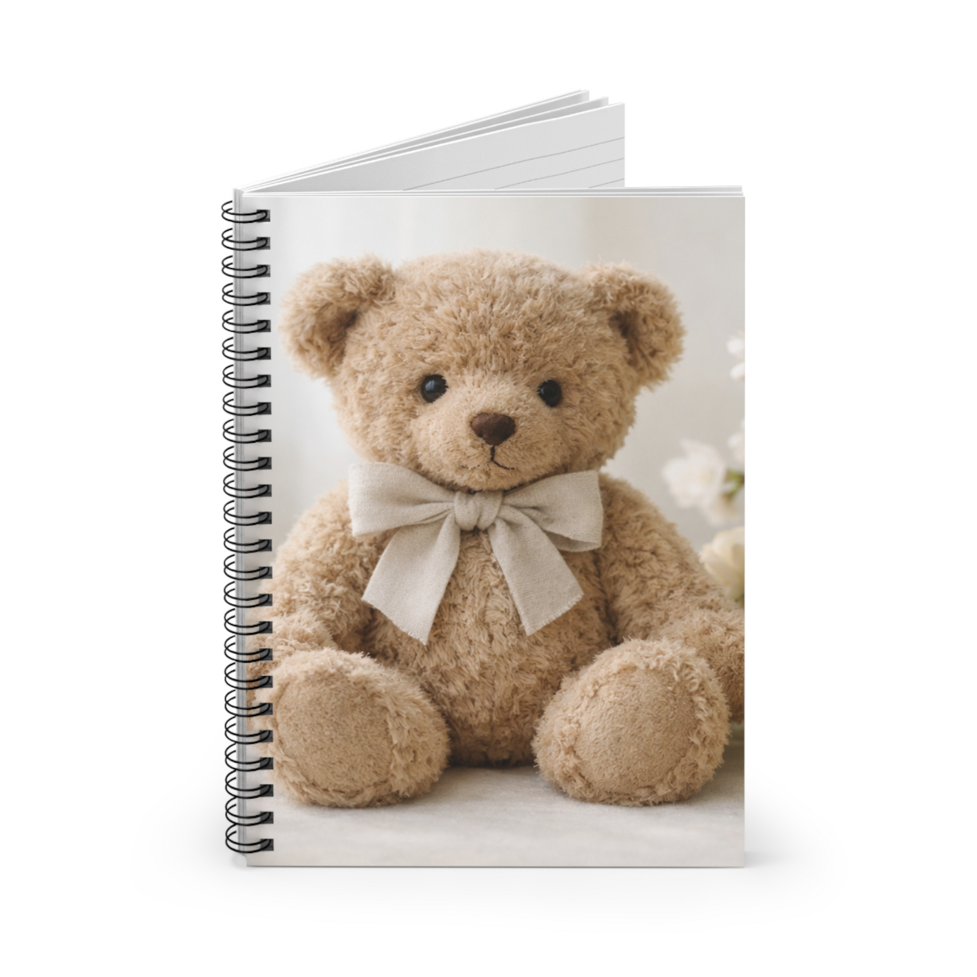Spiral-bound lined journal with teddy bear cover shown partially open