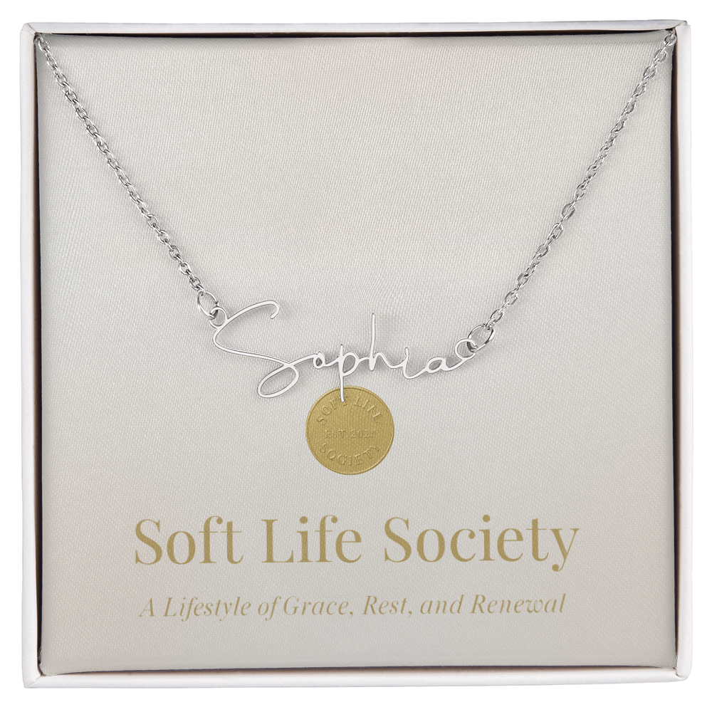 Soft Life Society Signature Style Name Necklace in silver with “Sophia” pendant displayed on elegant message card that reads “A Lifestyle of Grace, Rest, and Renewal.
