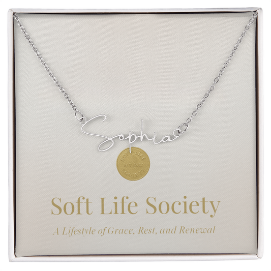 Soft Life Society Signature Style Name Necklace in silver with “Sophia” pendant displayed on elegant message card that reads “A Lifestyle of Grace, Rest, and Renewal.