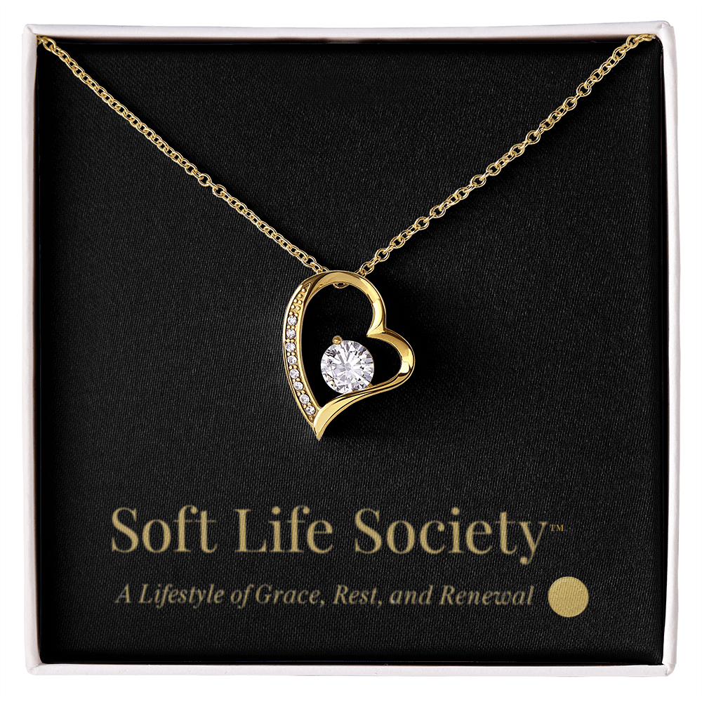 Gold Forever Love Necklace displayed in premium Soft Life Society™ gift box.