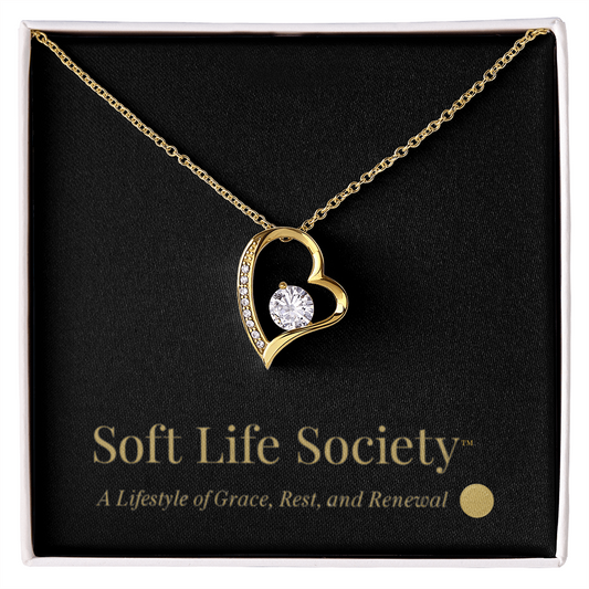 Gold Forever Love Necklace displayed in premium Soft Life Society™ gift box.