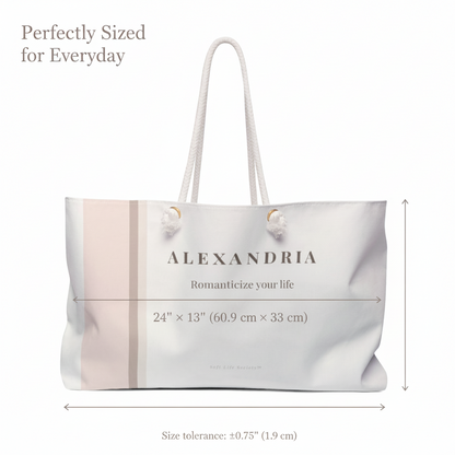 White tote bag with 'ALEXANDRIA' branding and dimensions on a white background